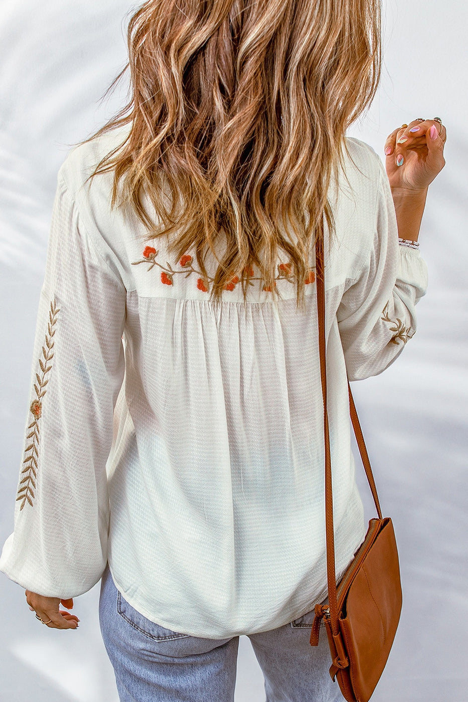 Floral embroidered tassel blouse
